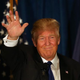 Republican presidential candidate Donald Trump waves to his supporters after primary day at his election night watch party at the Executive Court Banquet facility on Feb. 9, 2016, in Manchester, N.H.
Joe Raedle/Getty Images